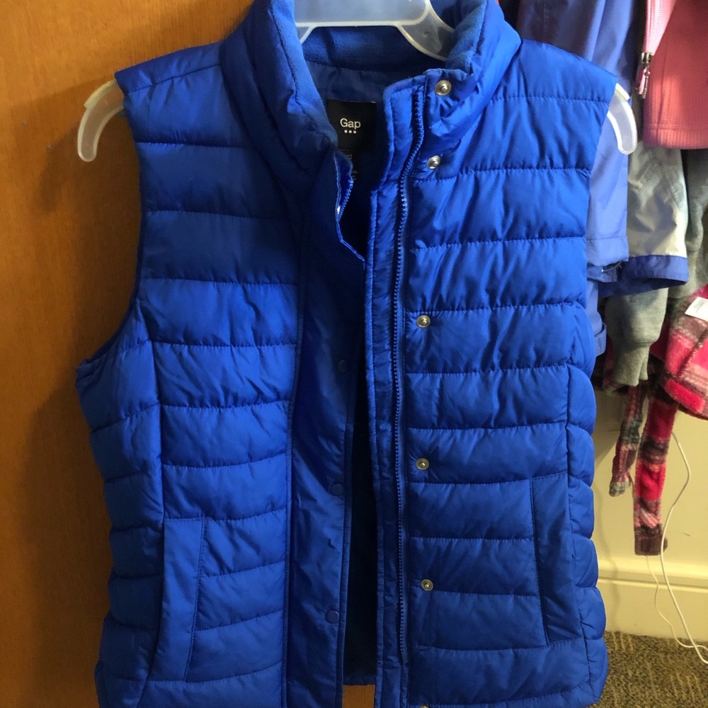 Gap, bright blue vest. Barley worn.